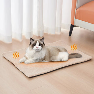 Self Heating Cat Bed – Cozy indoor pet bed with plush, self-warming material, reflecting natural body heat for warmth; ideal for winter comfort and no electricity needed. Perfect heated bed for cats seeking a safe, warm, and soft spot indoors.